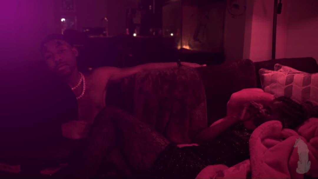 Pain music video still — datamoshed frame 008