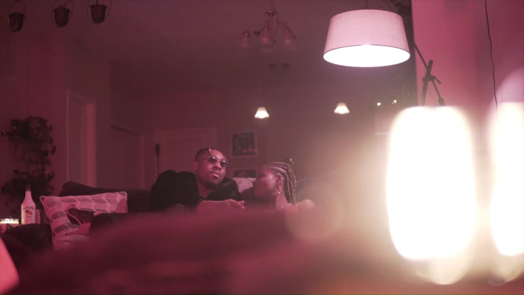 Pain music video still — datamoshed frame 010