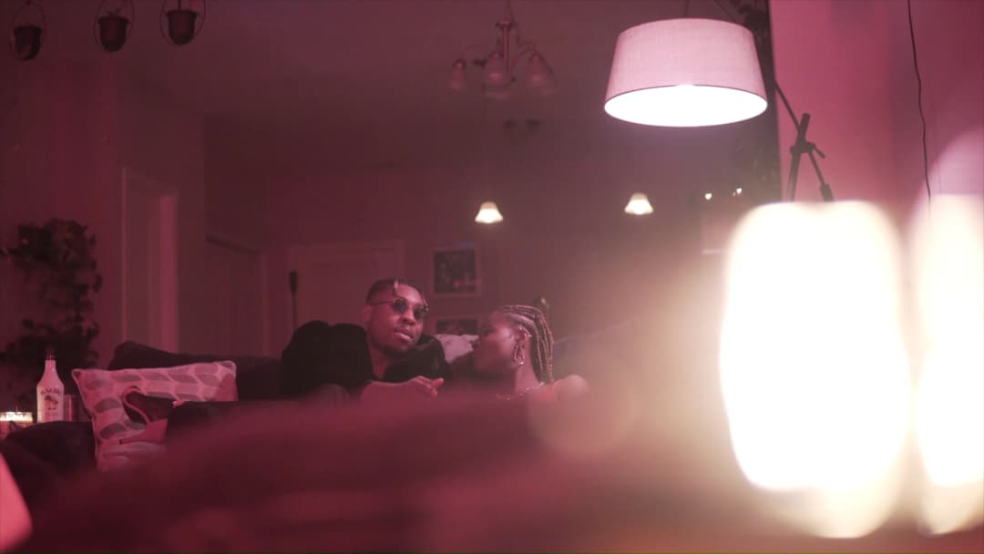 Pain music video still — datamoshed frame 011