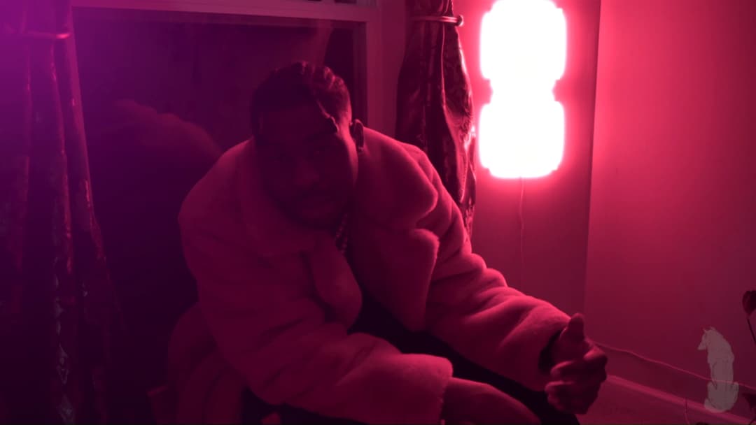 Pain music video still — datamoshed frame 022