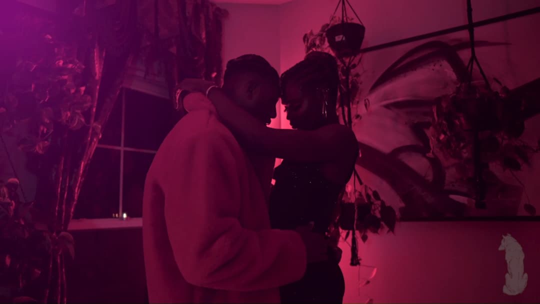 Pain music video still — datamoshed frame 025