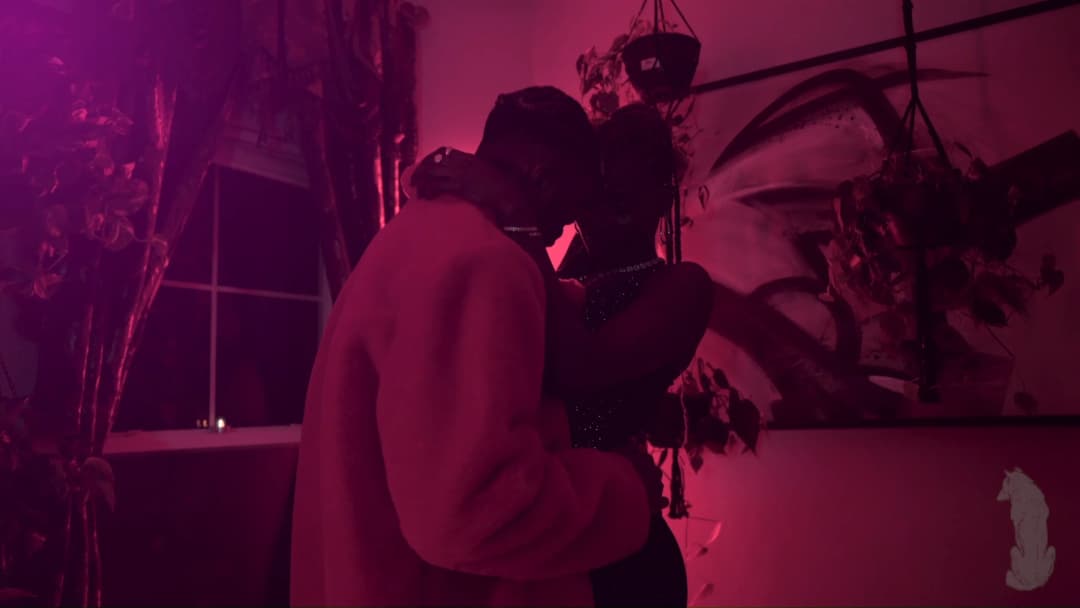 Pain music video still — datamoshed frame 026