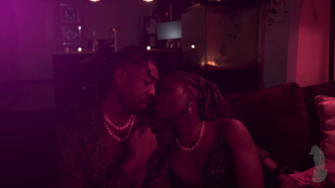 Pain music video still — datamoshed frame 027