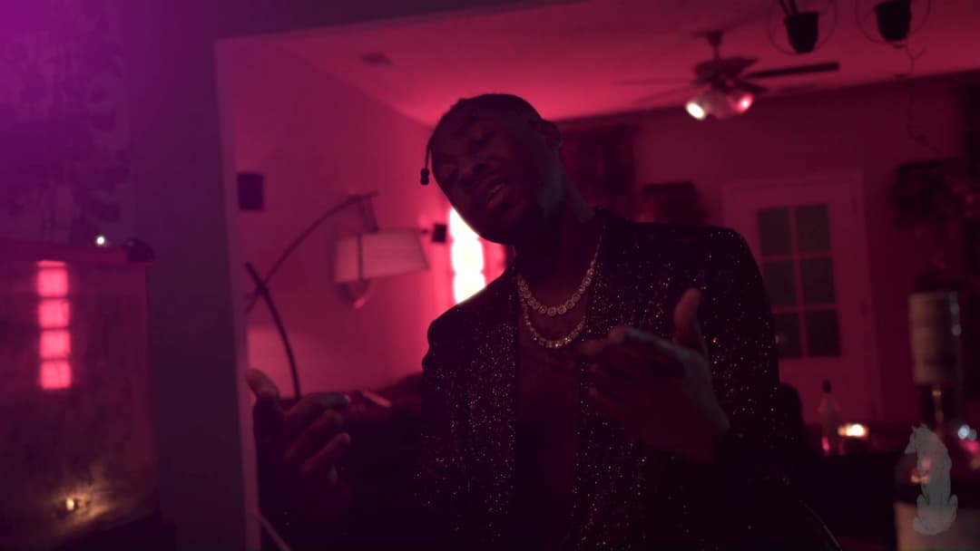 Pain music video still — datamoshed frame 033