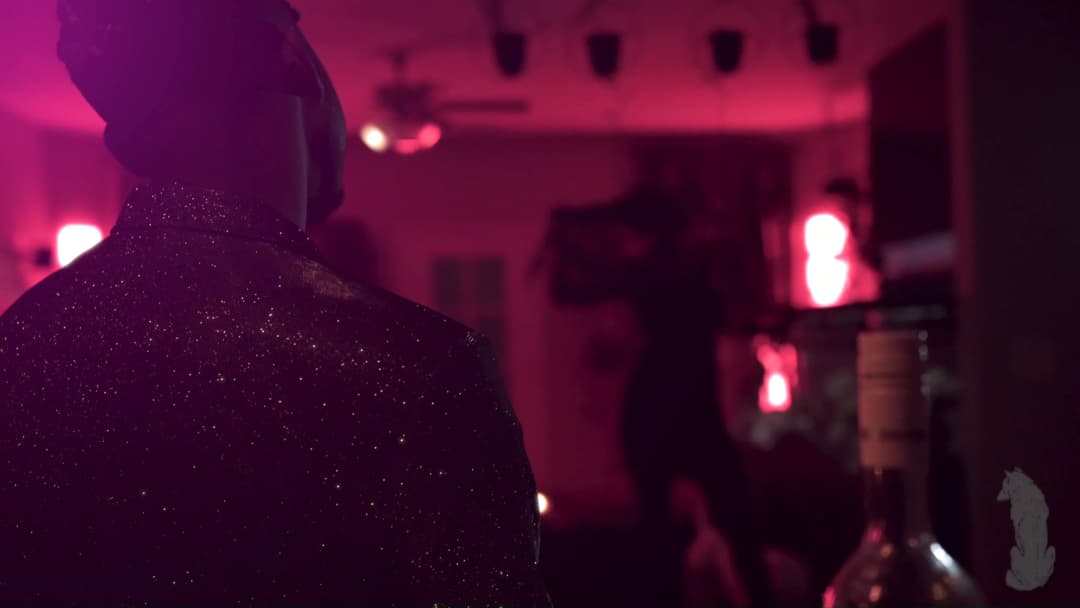 Pain music video still — datamoshed frame 037