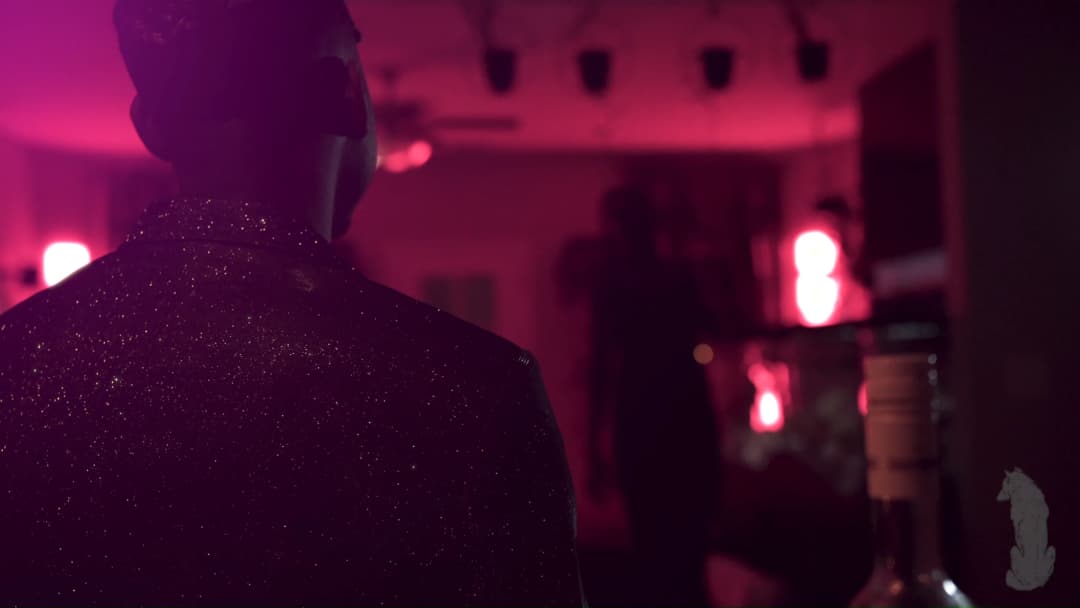 Pain music video still — datamoshed frame 039