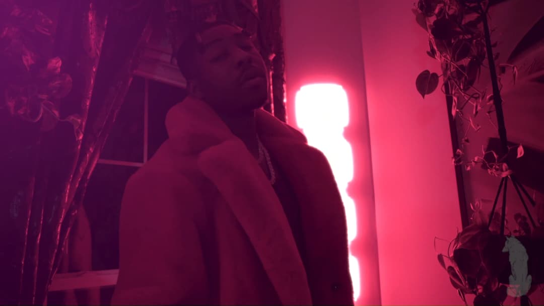 Pain music video still — datamoshed frame 040