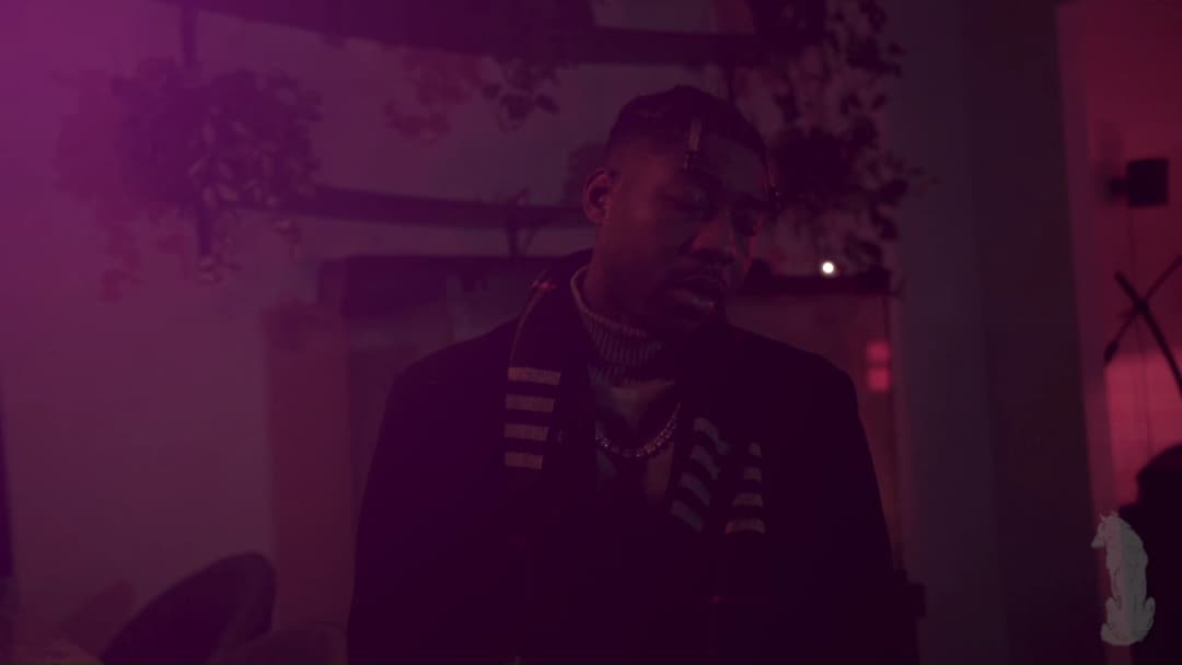 Pain music video still — datamoshed frame 046