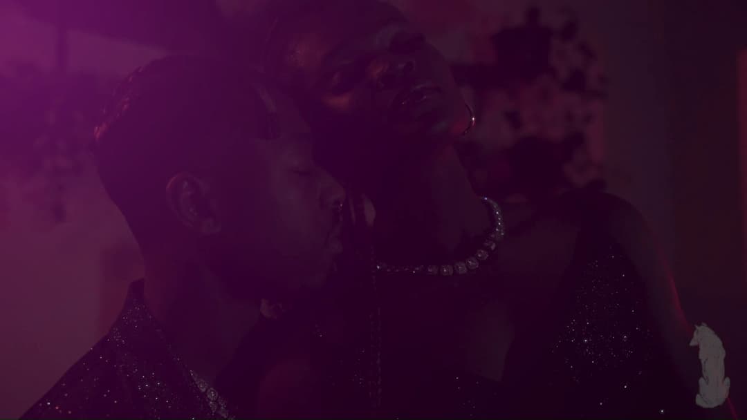 Pain music video still — datamoshed frame 052