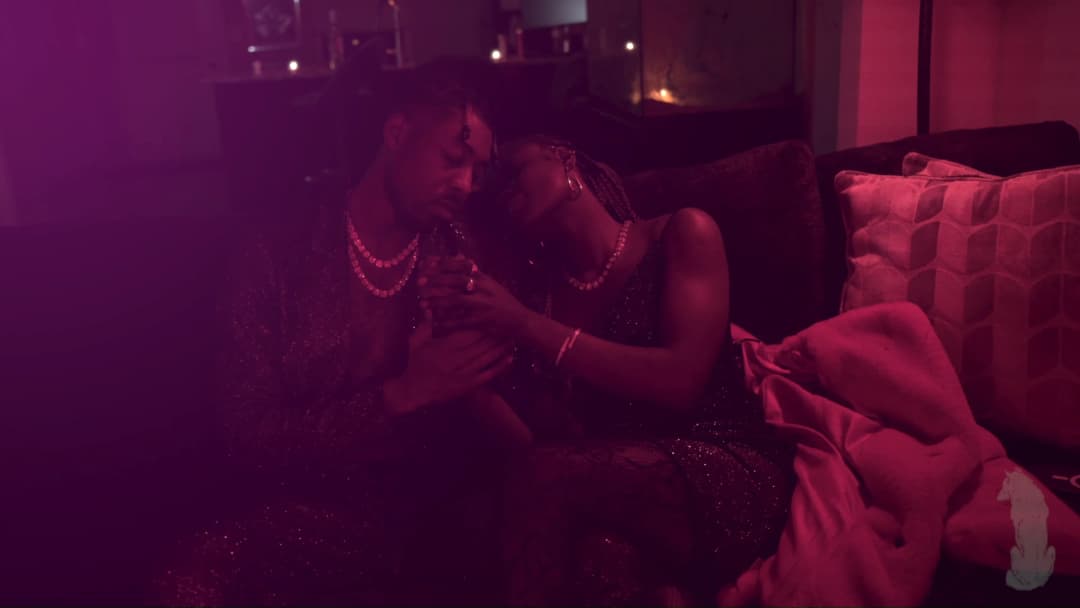 Pain music video still — datamoshed frame 054