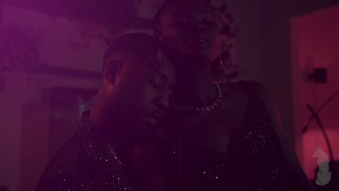 Pain music video still — datamoshed frame 055