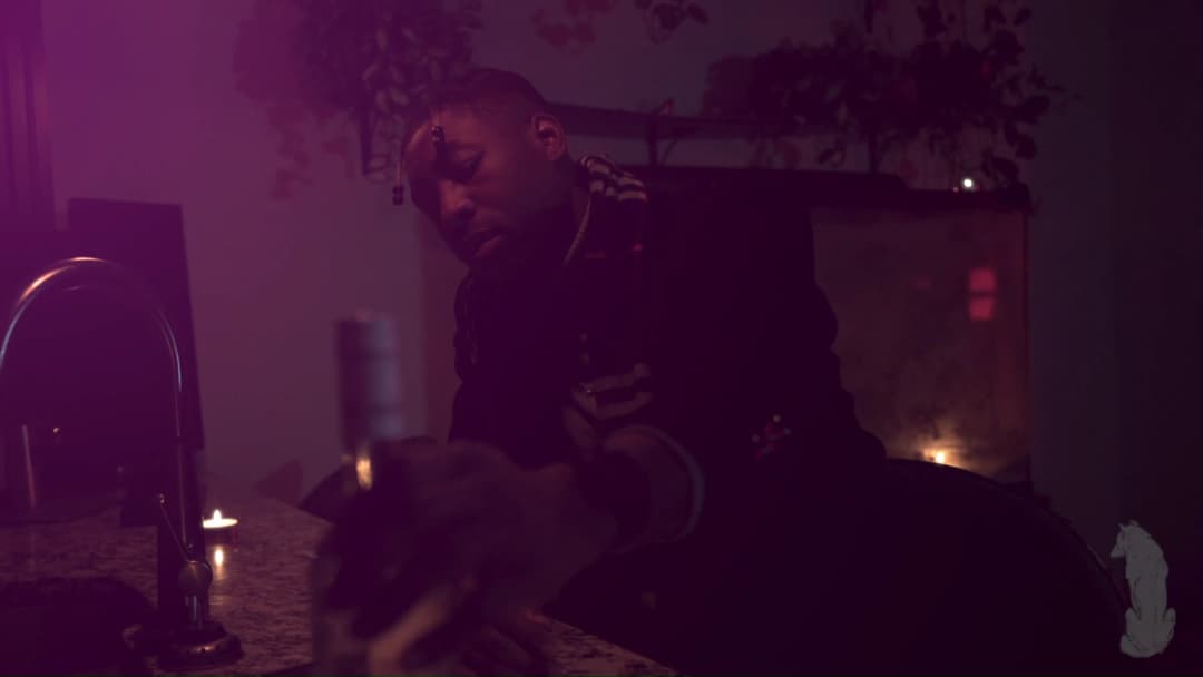 Pain music video still — datamoshed frame 059