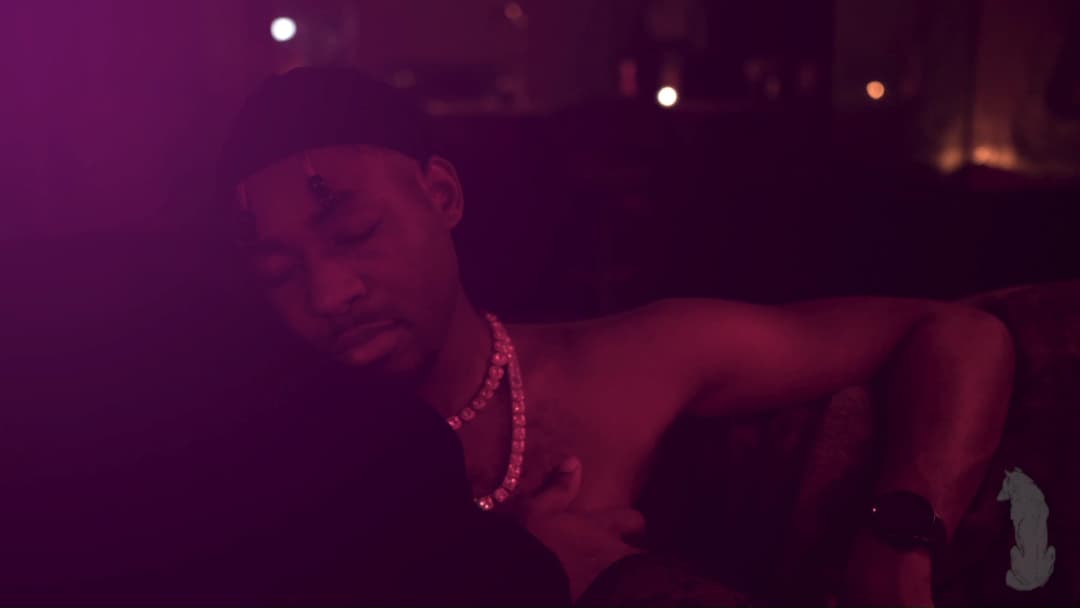 Pain music video still — datamoshed frame 061