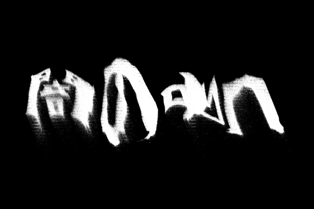 Alpha The Wolf title rendered as large, heavily smeared white brush-stroke kanji on a pure black background with a raw, analog hand-painted distortion quality