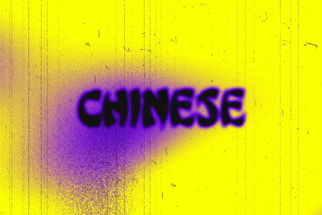 A graphic title card: bold purple spray-paint text spelling 'CHINESE' on a saturated yellow background with a soft purple halo bloom, the word slightly blurred at the edges giving it the look of freshly tagged street art