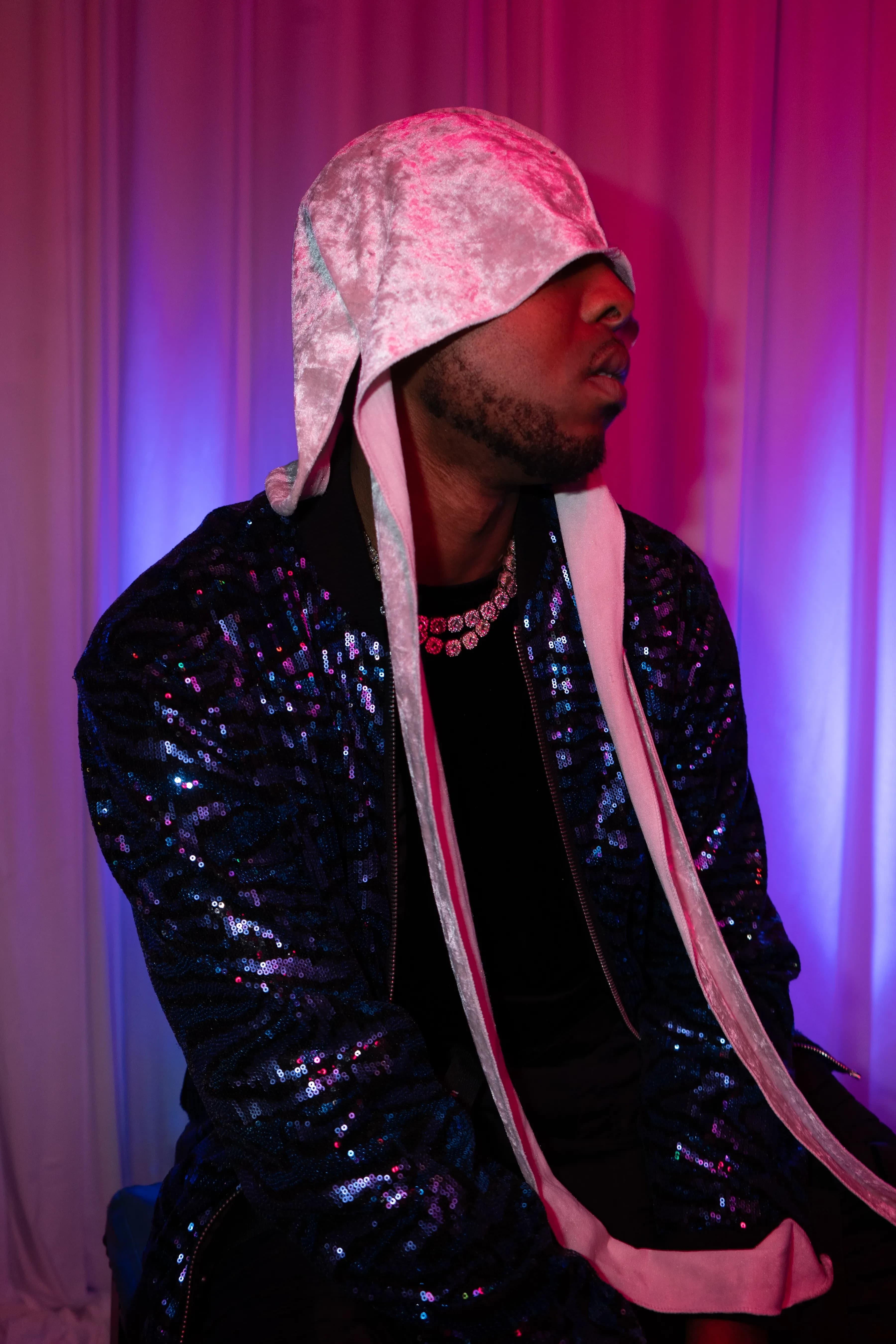 Alpha The Wolf Hides in Plain Sight in Blue Sequins for "Antisocial"