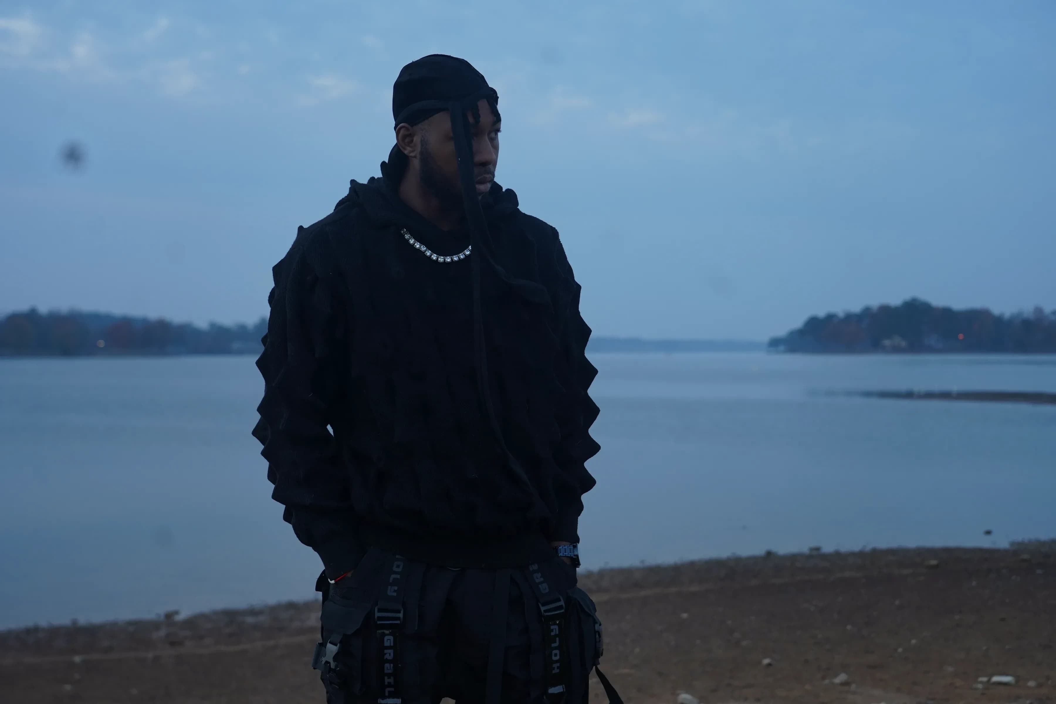 Alpha The Wolf Walks a Bare Sandbar at Blue Hour for "Lakeside"